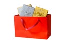 Shopping bag with gift boxes isolated on white Royalty Free Stock Photo