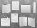 Shopping bag mockups. Empty handbag white paper fashion bag with handle vector 3d isolated template Royalty Free Stock Photo