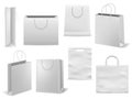 Shopping bag. Realistic white handbag mockup. Empty paper fashion square packaging with handles. 3D cardboard sacks Royalty Free Stock Photo