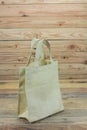 Shopping bag ,recycled sack bag on wooden background Royalty Free Stock Photo