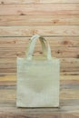 Shopping bag ,recycled sack bag on wooden background Royalty Free Stock Photo