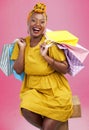 Shopping bag, studio portrait and black woman excited for discount promotion, fashion spree choice or commerce deal Royalty Free Stock Photo