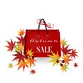 Shopping bags with Autumn Sale text, fall leaves and acorn isolated on white background. Special autumn sale banner Royalty Free Stock Photo