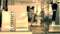 Shopping bags with Florence text. Shopping in Italy related conceptual 3D rendering