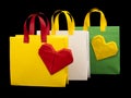 Shopping bags with heart. Isolated origami