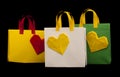 Shopping bags with heart. Isolated origami