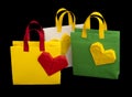 Shopping bags with heart. Isolated origami