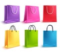 Shopping bags vector set. Colorful empty paper bag collection for store shopping