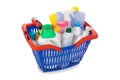 Shopping basket with detergent bottles and chemical cleaning sup Royalty Free Stock Photo