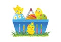 Shopping basket with Easter eggs and chicks Royalty Free Stock Photo