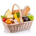 shopping basket with fresh produce, bread, and cheese