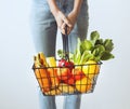 Shopping basket full of fruits and vegetables Royalty Free Stock Photo