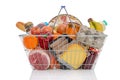 Shopping basket full of groceries isolated