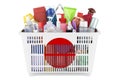 Shopping basket with Japanese flag full of cosmetic bottles, hair, facial skin and body care products. 3D rendering