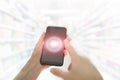 Shopping basket on a mobile phone screen. Woman Hand holding mobile phone on Supermarket blur background Royalty Free Stock Photo