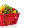 Shopping Basket oveflowing with fresh Vegetables Royalty Free Stock Photo