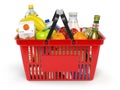 Shopping basket with variety of grocery products isolated on white background.