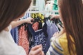 Shopping with bestie. two women shopping in retail store. Close up view