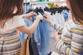 Shopping with bestie. Two women in retail store. Close up view