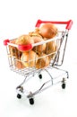 Shopping car with onions Royalty Free Stock Photo