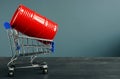 Shopping cart and Barrel with oil as symbol of trading