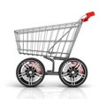 Shopping cart with big car wheel Royalty Free Stock Photo