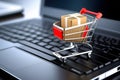 Shopping cart with cardboard boxes on laptop keyboard for online shopping concept. 3d rendering Royalty Free Stock Photo