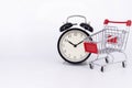 Alarm clock with shopping cart