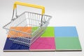shopping cart on colored pads Royalty Free Stock Photo