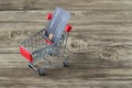 Shopping cart with credit card. Stay home shopping and electronic payment with credit card concept. Small shopping cart with credi Royalty Free Stock Photo