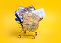 Shopping cart with different tablets and pills