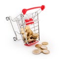 Shopping cart with euro coins in it is falling on white background. Conceptual representation of a failure, poverty and being brok