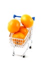 Shopping cart filled with mandarines