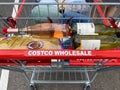 A shopping cart filled with purchases at a Costco Wholesale retail store in Orlando, Florida