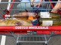 A shopping cart filled with purchases at a Costco Wholesale retail store in Orlando, Florida