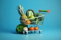 Shopping cart filled with variety of fresh fruits and vegetables. Perfect for illustrating healthy eating, grocery shopp Royalty Free Stock Photo