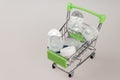shopping cart shopping cart filled with various containers and packages with modern soft contact lenses