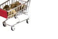 Shopping cart full of coins on white background, shopping Royalty Free Stock Photo