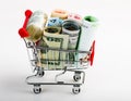 Shopping cart full of money (dollar, euro )