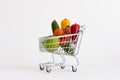 Shopping cart full of vegetables. Vegan food, healthy diet. Royalty Free Stock Photo