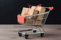 Shopping cart with gift boxes on wooden table. Black background. Mini shopping cart with shopping bags and boxes, AI Generated