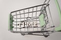 shopping cart with the inscription time lined with letters, the concept of a for a limited and valuable time