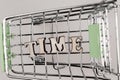 Shopping cart with the inscription time lined with letters