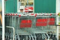 Shopping cart outside an Auchan supermarket. Royalty Free Stock Photo