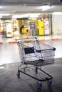 Shopping Cart in the parking at supermarket. Royalty Free Stock Photo