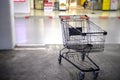 Shopping Cart in the parking at supermarket. Royalty Free Stock Photo