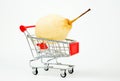 Shopping cart with pear Royalty Free Stock Photo