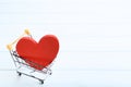 Shopping cart with red heart Royalty Free Stock Photo