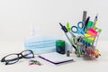 Shopping cart with school supplies - back to school during a COVID-19 pandemic - new normal Royalty Free Stock Photo