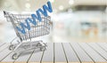 Shopping cart with www isolated on background Royalty Free Stock Photo